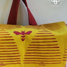 The Vagabond Backpack – Red Dahlia & Beehive Print